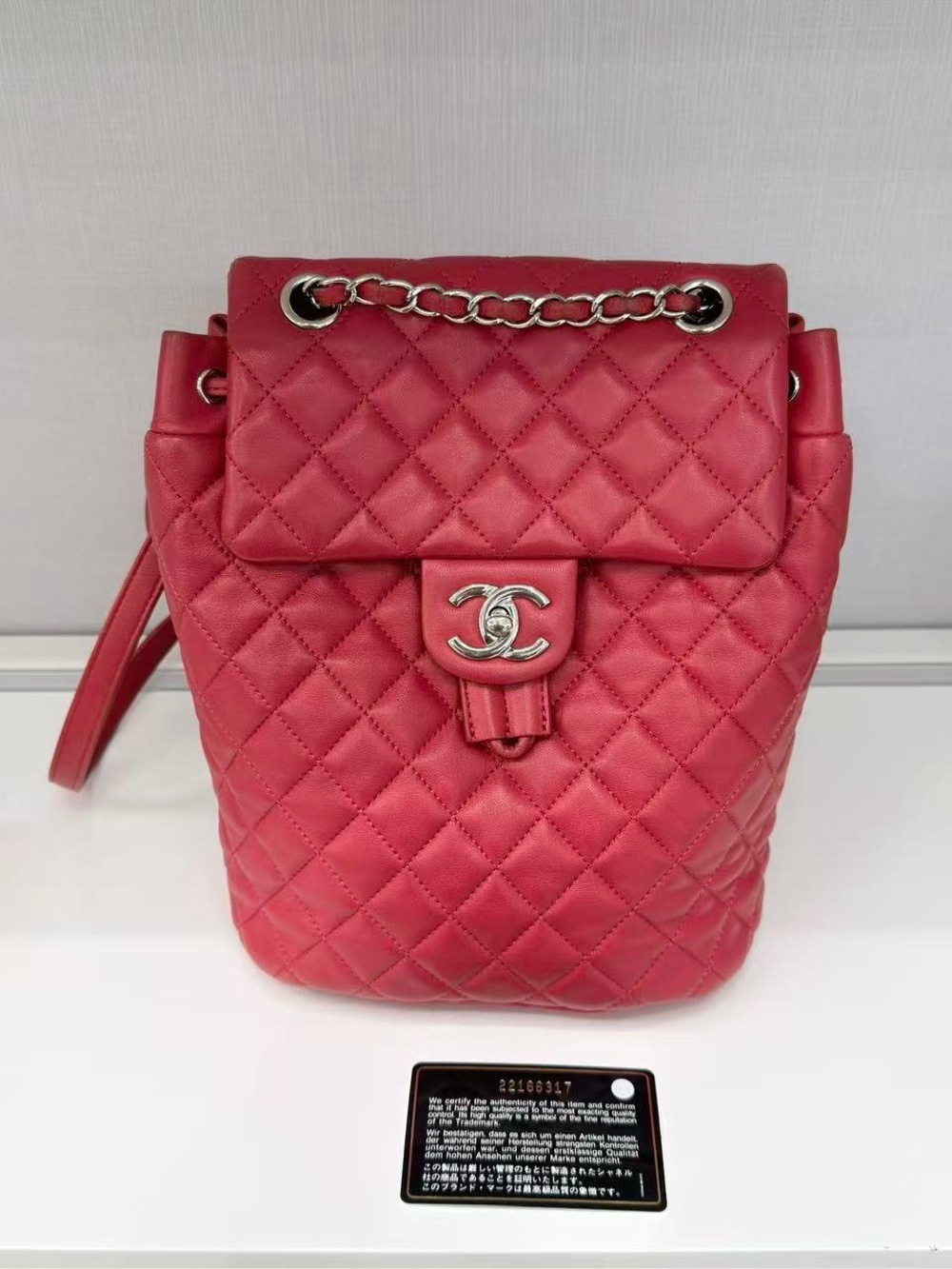CHANEL Red Quilted Lambskin Backpack with Silver Hardware